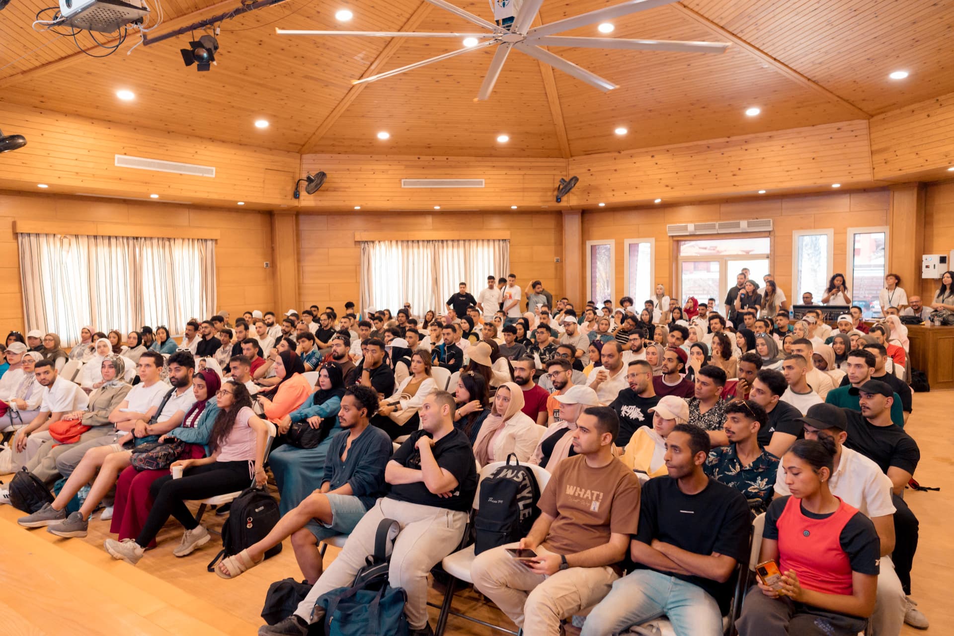 A full auditorium of employees at a company conference